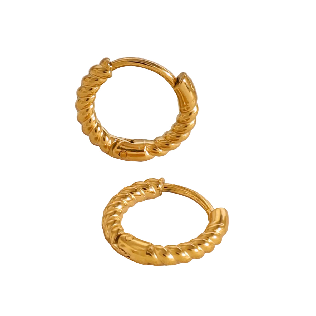 Pair of gold hoop earrings on a beige background