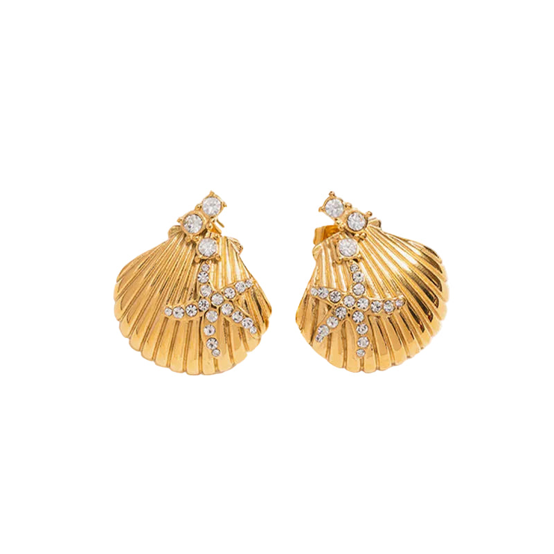 A pair of gold shell-shaped earrings with a star design set with small clear crystals, displayed on a clean white background.