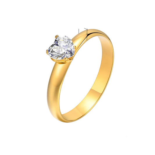Gold ring with a clear gemstone on a white background